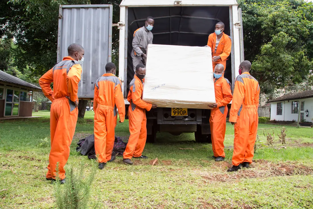 KejaMove crew preparing a household move in Kisumu