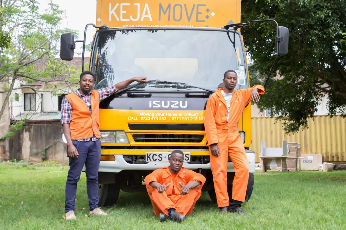 KejaMove crew carefully handling a customer's belongings during a move